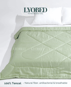 LYOBED duvet cover in soft green color, made from 100% Tencel™, antibacterial and breathable fabric.